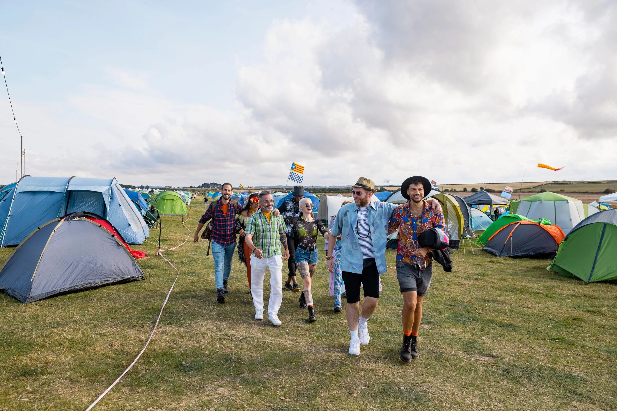 Festival attendees heading toward a live music area