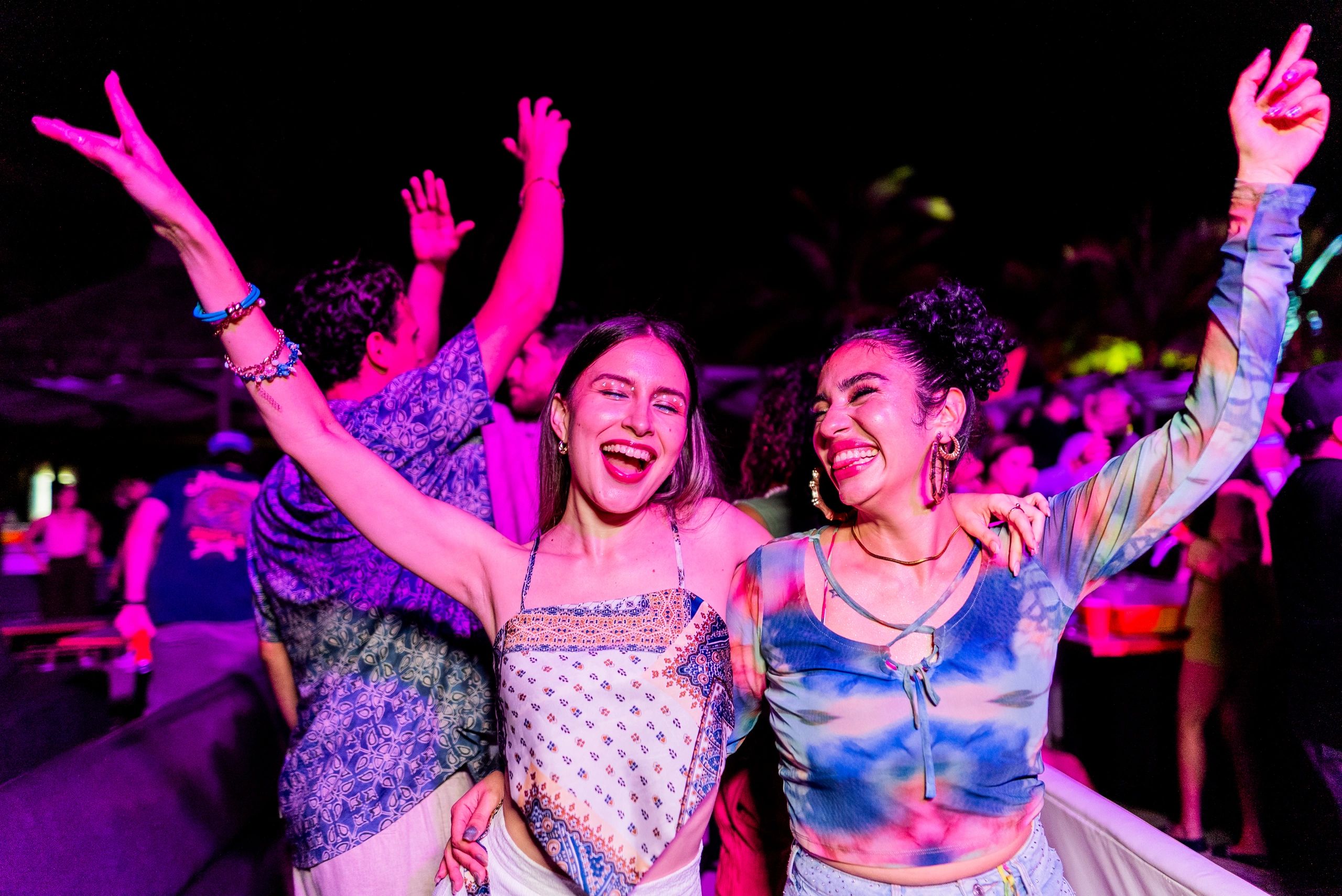 Friends enjoying live music outdoors
